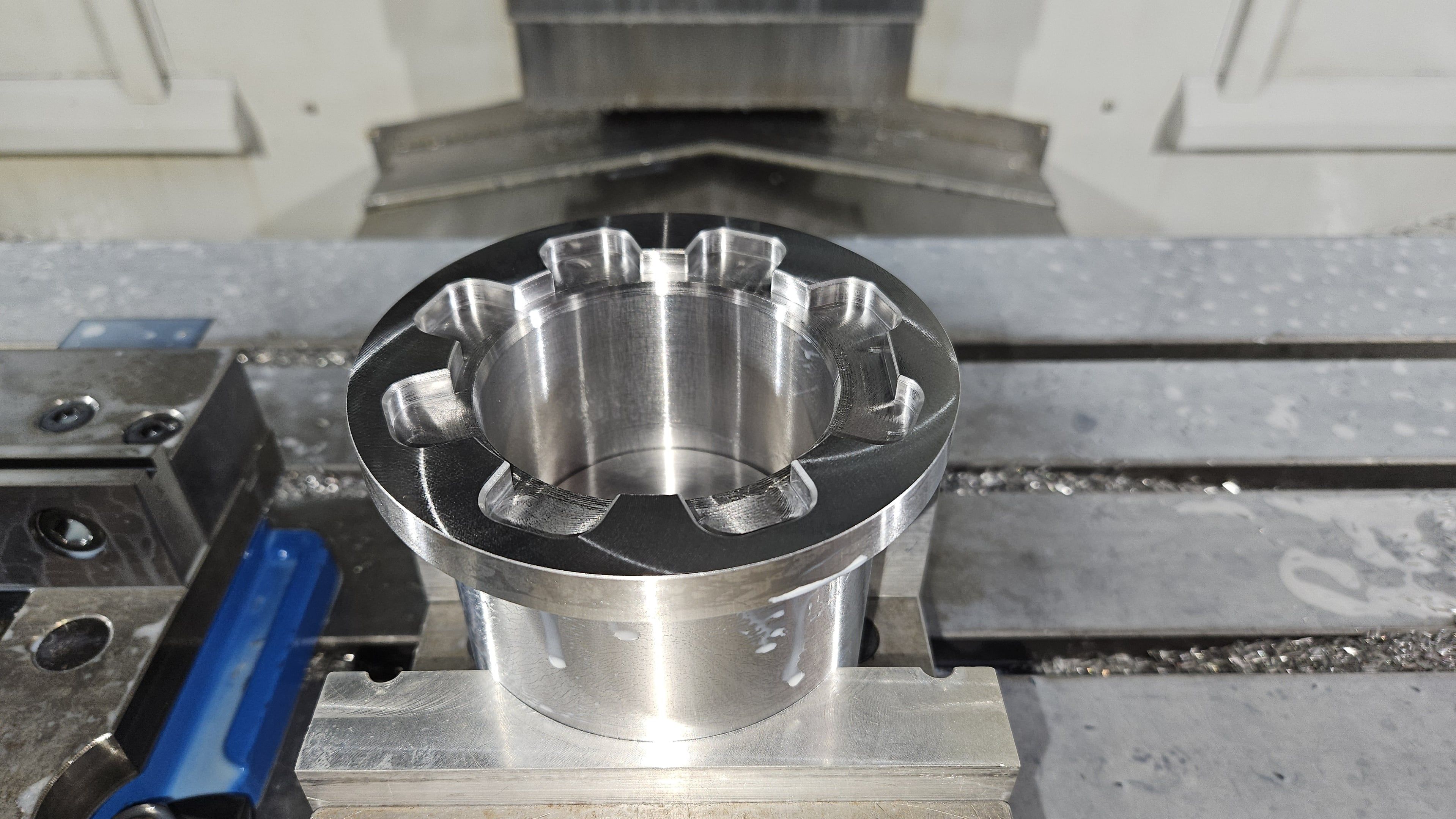Fluted steel collet fixture being bored on a CNC vertical mill